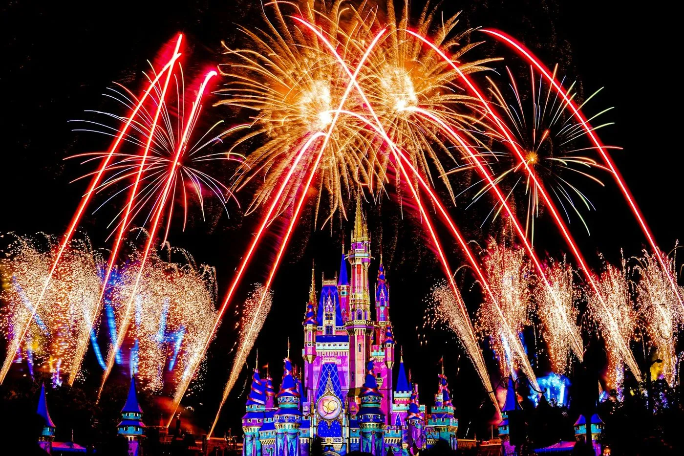 Fireworks bursting over Cinderella Castle at Magic Kingdom