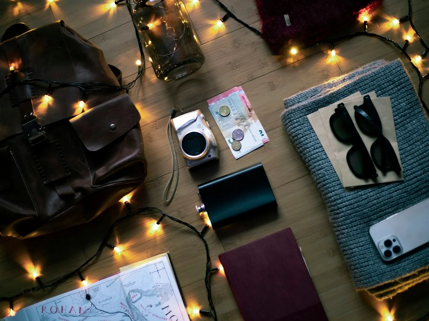 A flat-lay of travel essentials packed for a trip
