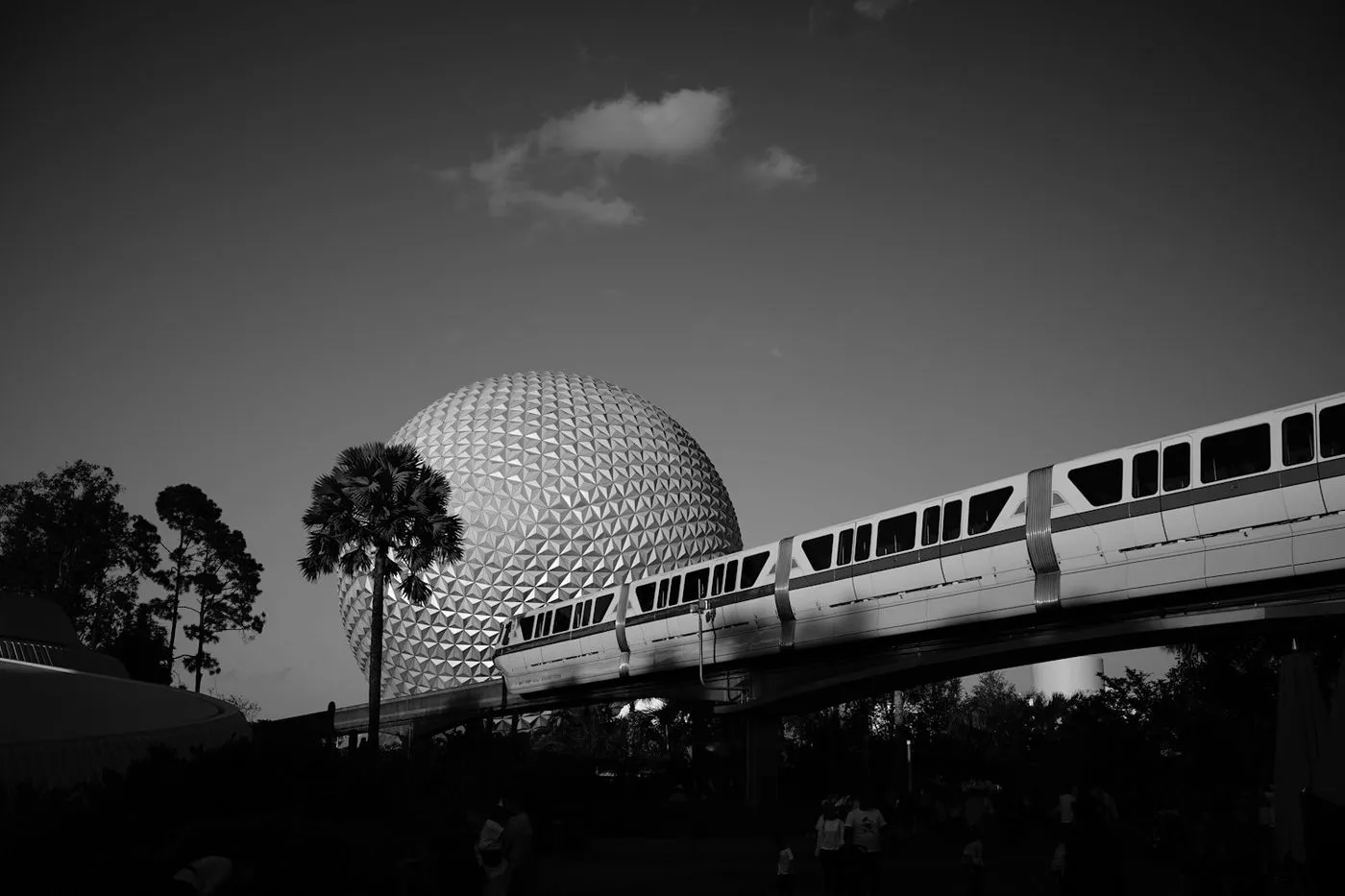 A Walt Disney World monorail passing Spaceship Earth at EPCOT